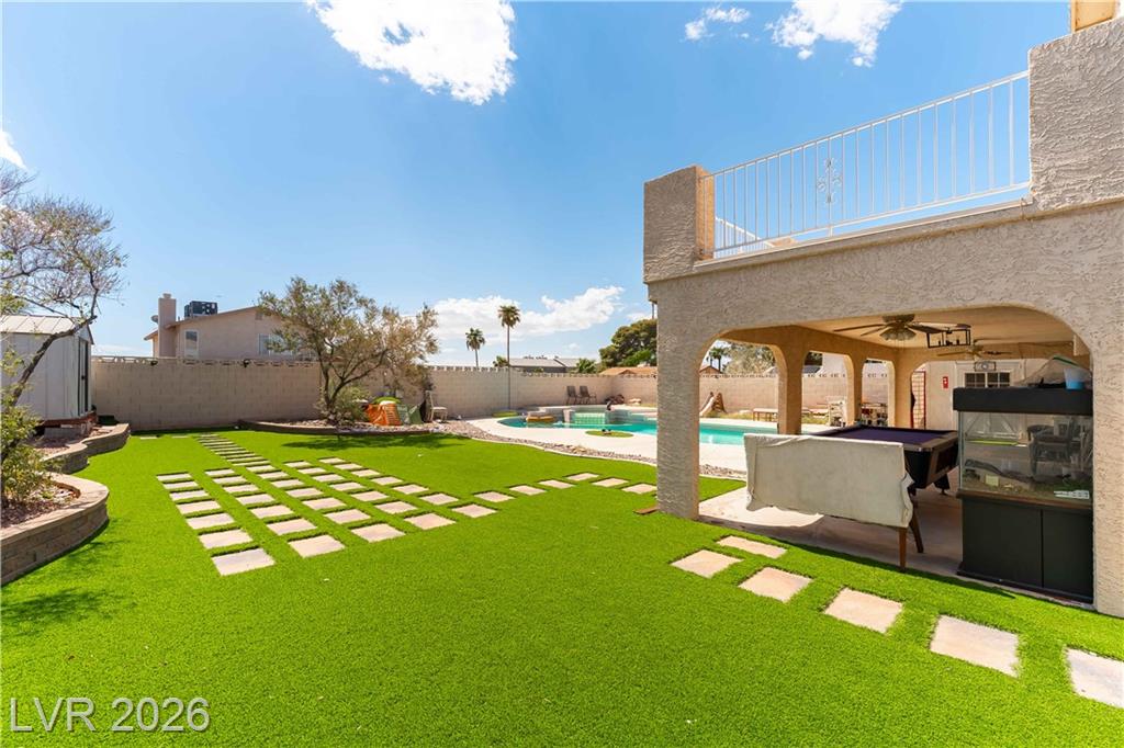 Covered patio and generous backyard